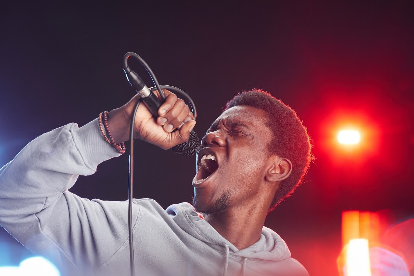 african-american-man-singing-on-stage-9T9Y6Q3.jpg